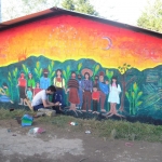 Jovanni working on the group's mural in Oventic